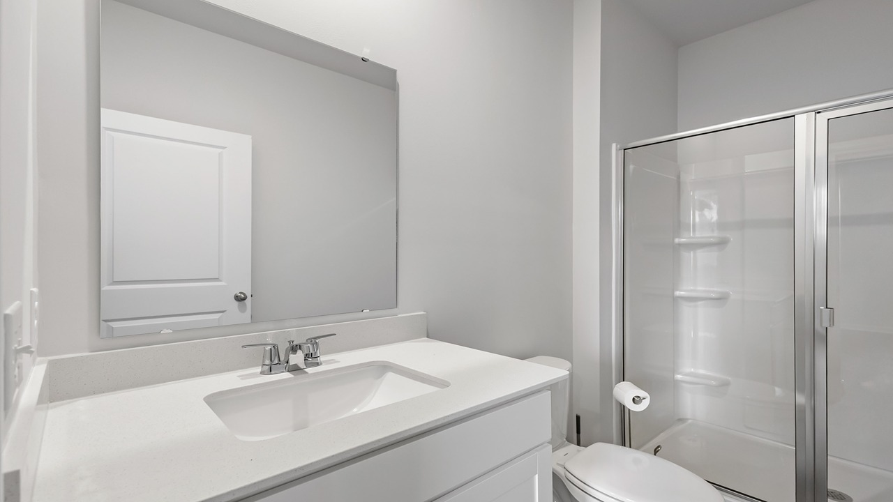 primary bathroom with walk in shower