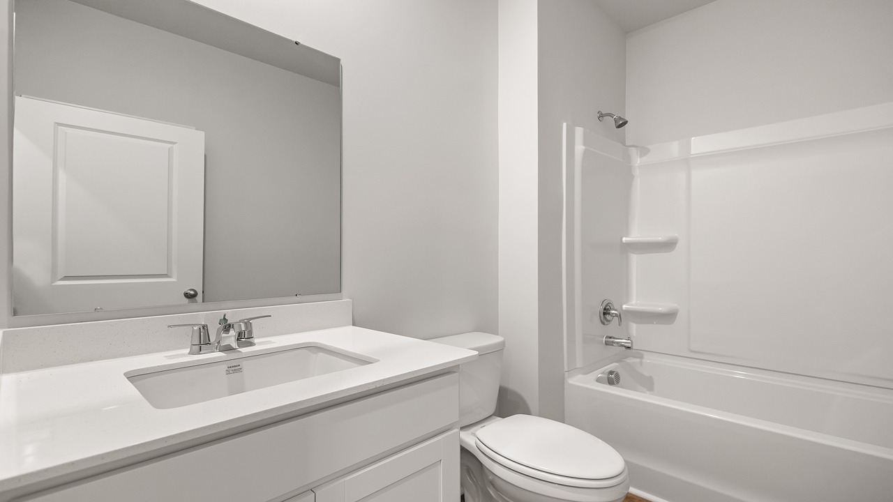 guest bathroom with tub