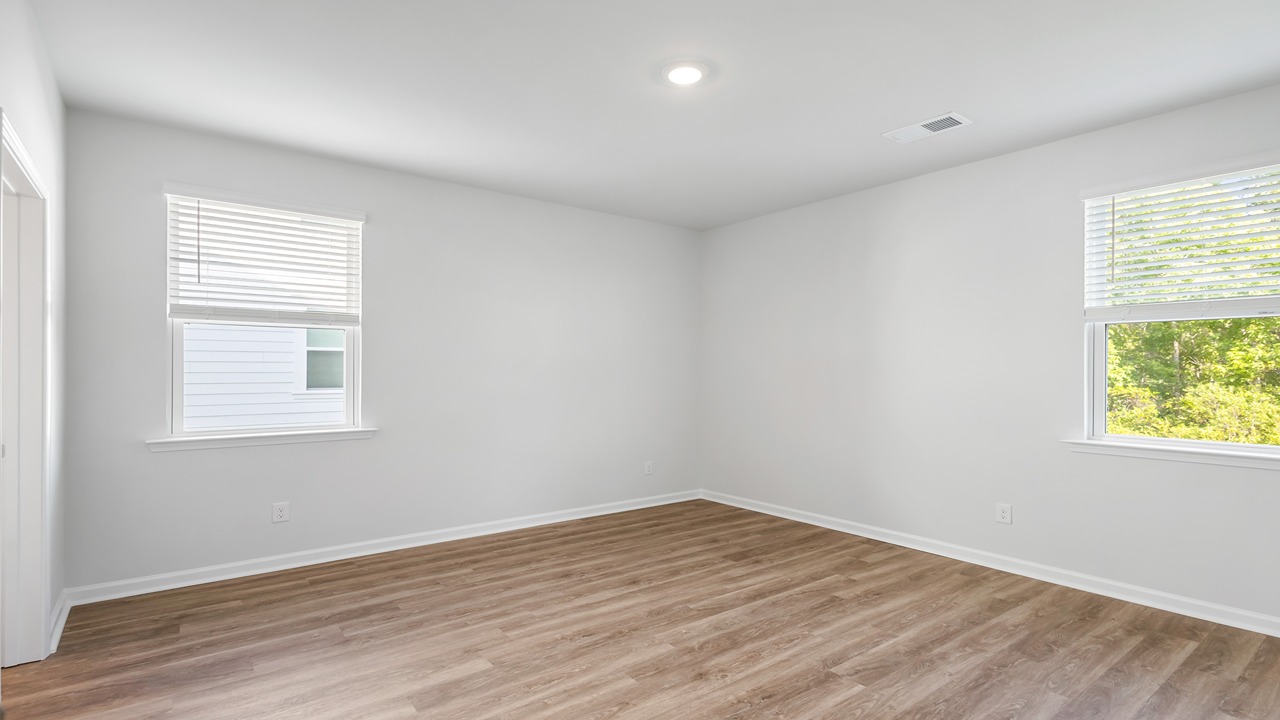 primary bedroom with natural light