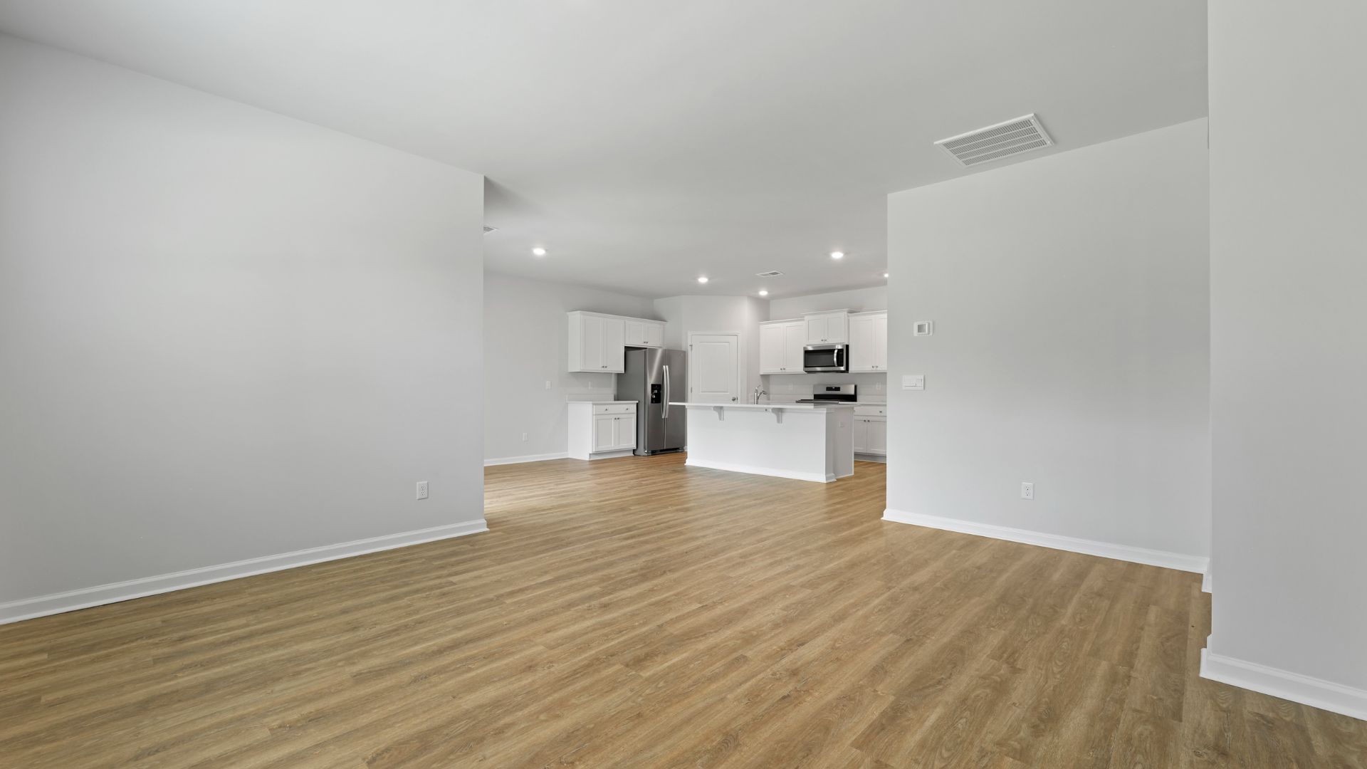 The living room, kitchen and dining room are open concept.