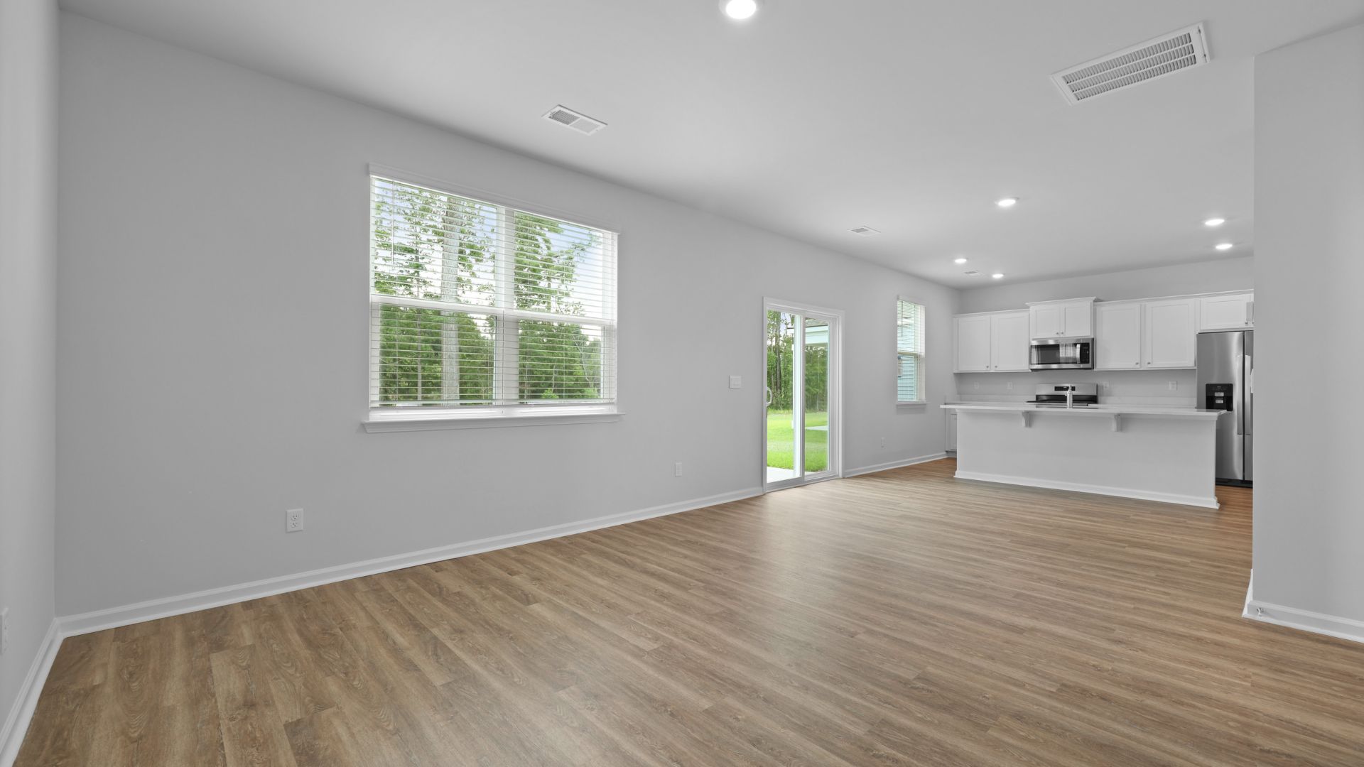 Open concept floorplan with natural lighting