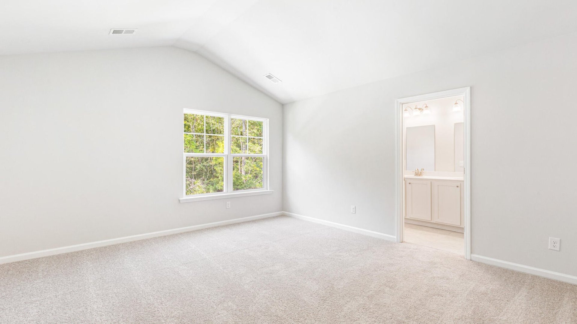 The primary bedroom is located upstairs and has an ensuite primary bathroom.