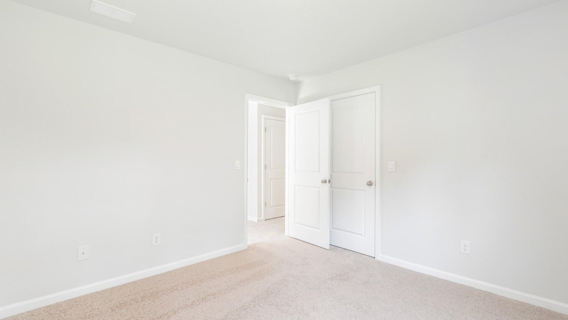 Bedroom 3 is bright and spacious for comfort.