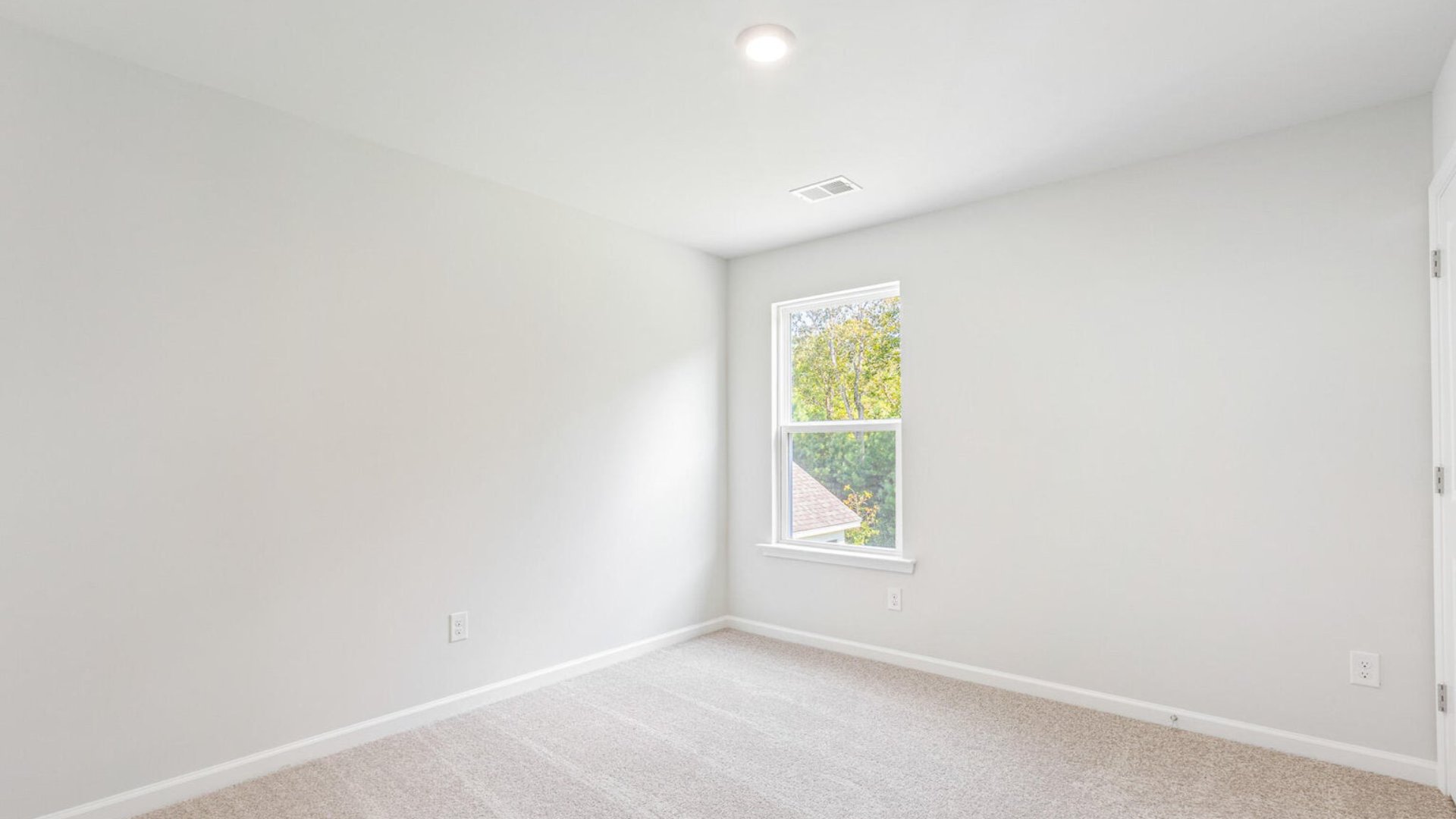 Bedroom 2 is located next to bedroom 3.