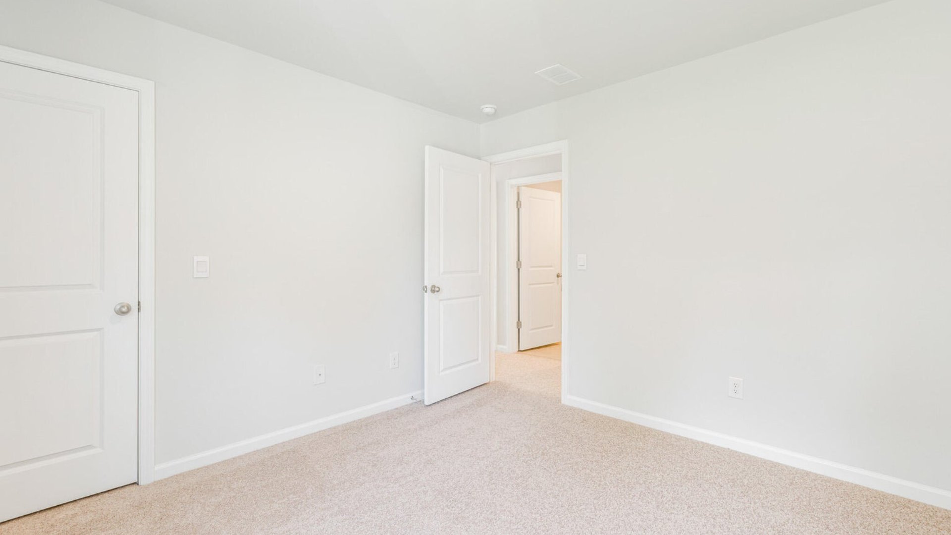 Bedroom 2 is spacious and bright for comfort.