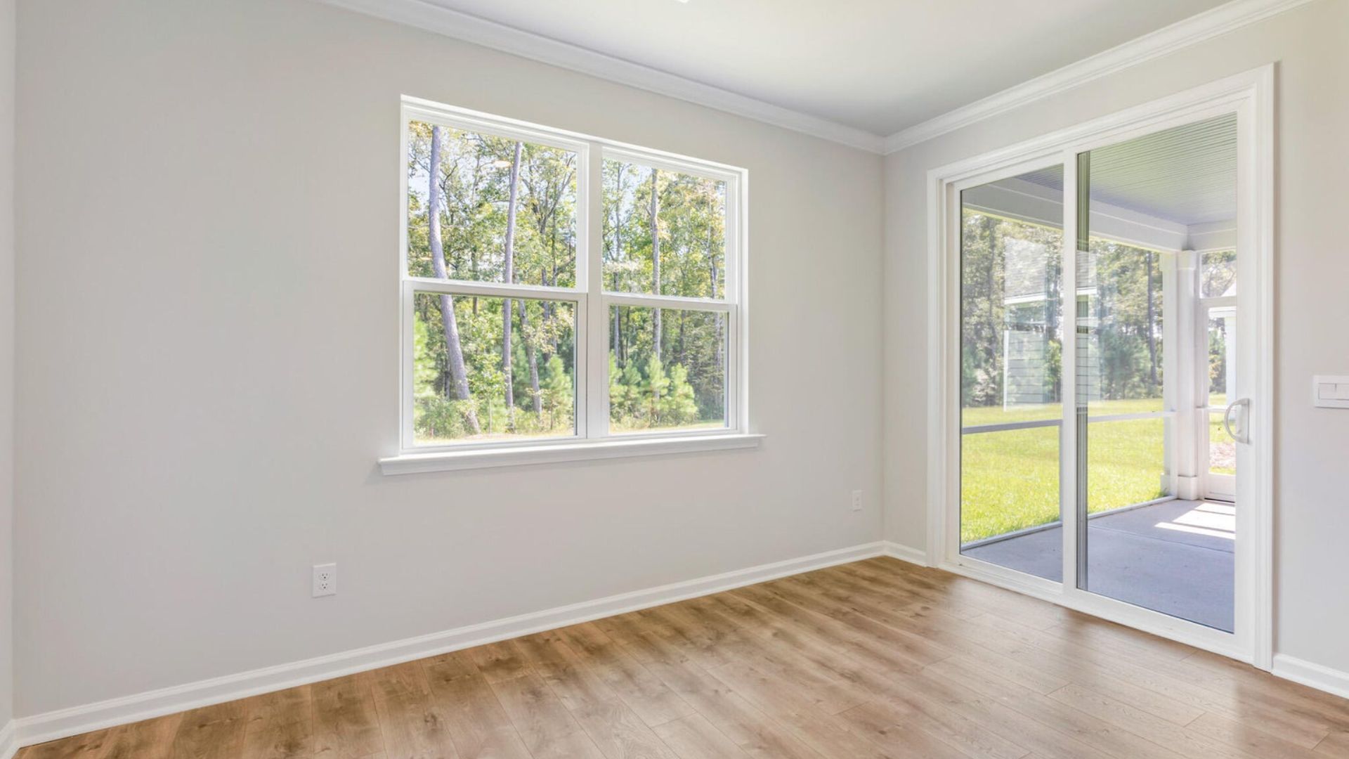 Sliding glass doors that lead out to the backyard and patio.