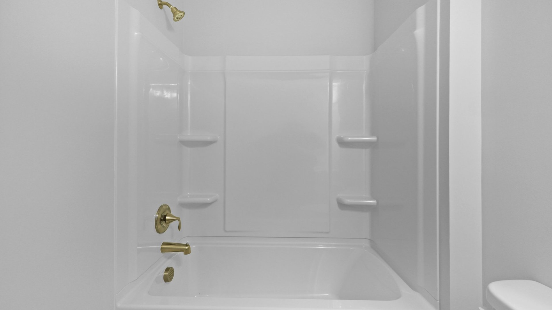 The full bathroom located downstairs has a tub-shower combination.