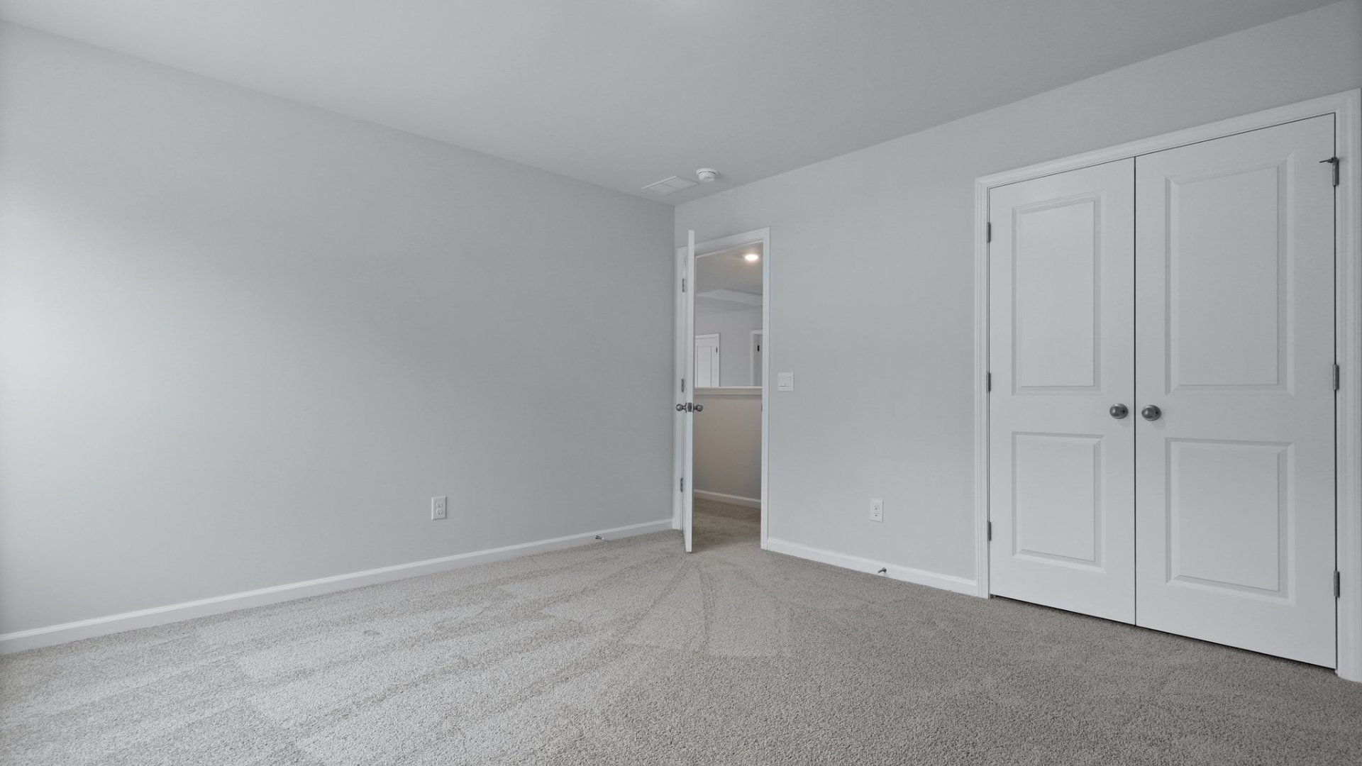 Bedroom 2 is spacious and bright.