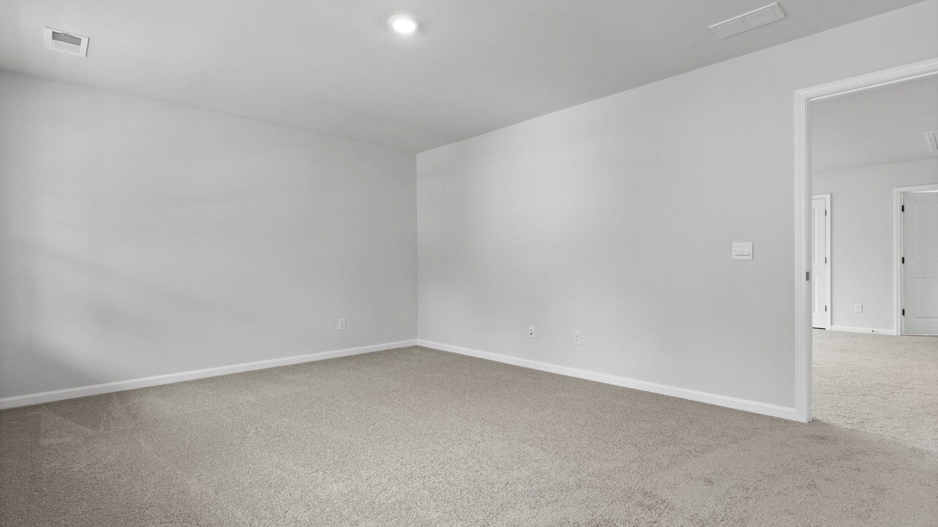 Bedroom 3 is spacious and bright.