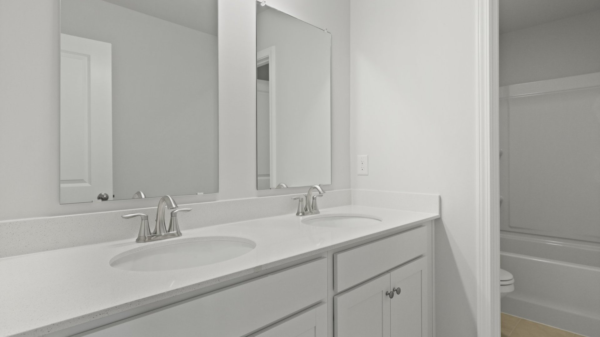 Double vanities are located in the upstairs bathroom 3.