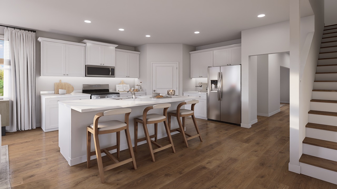 white kitchen cabinet with large island