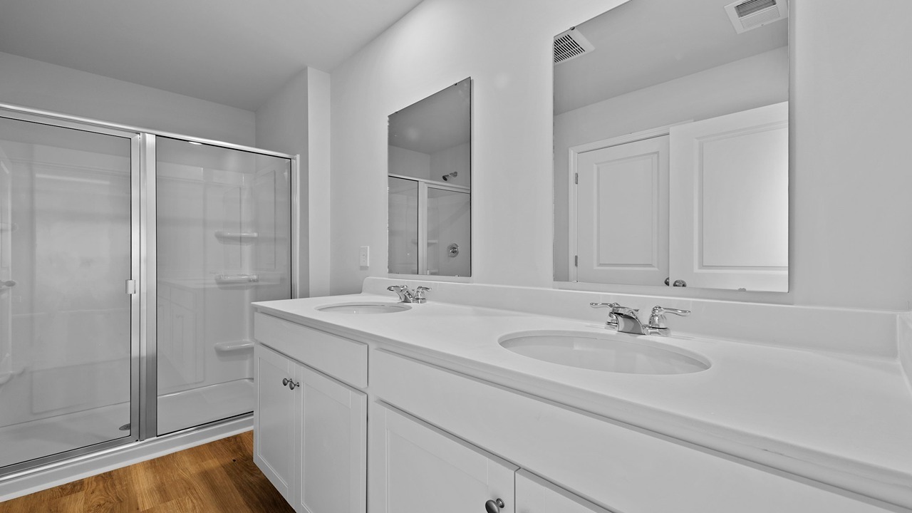 Secondary bathroom with dual vanity