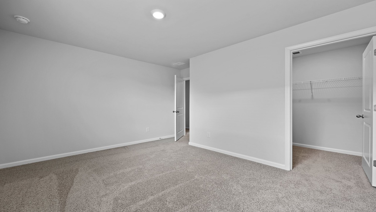 Guest bedroom with ample closet space