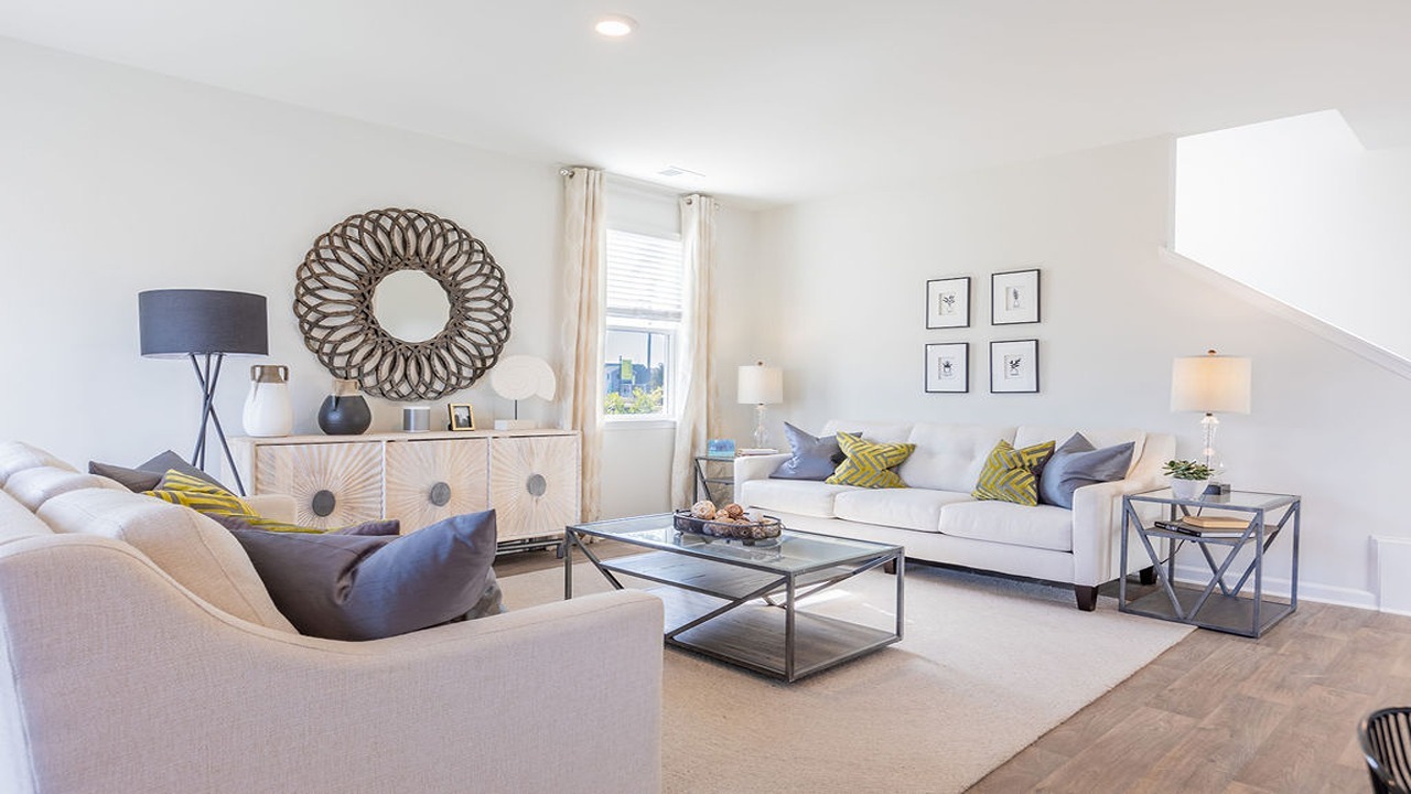 Living room connected to dining room and kitchen