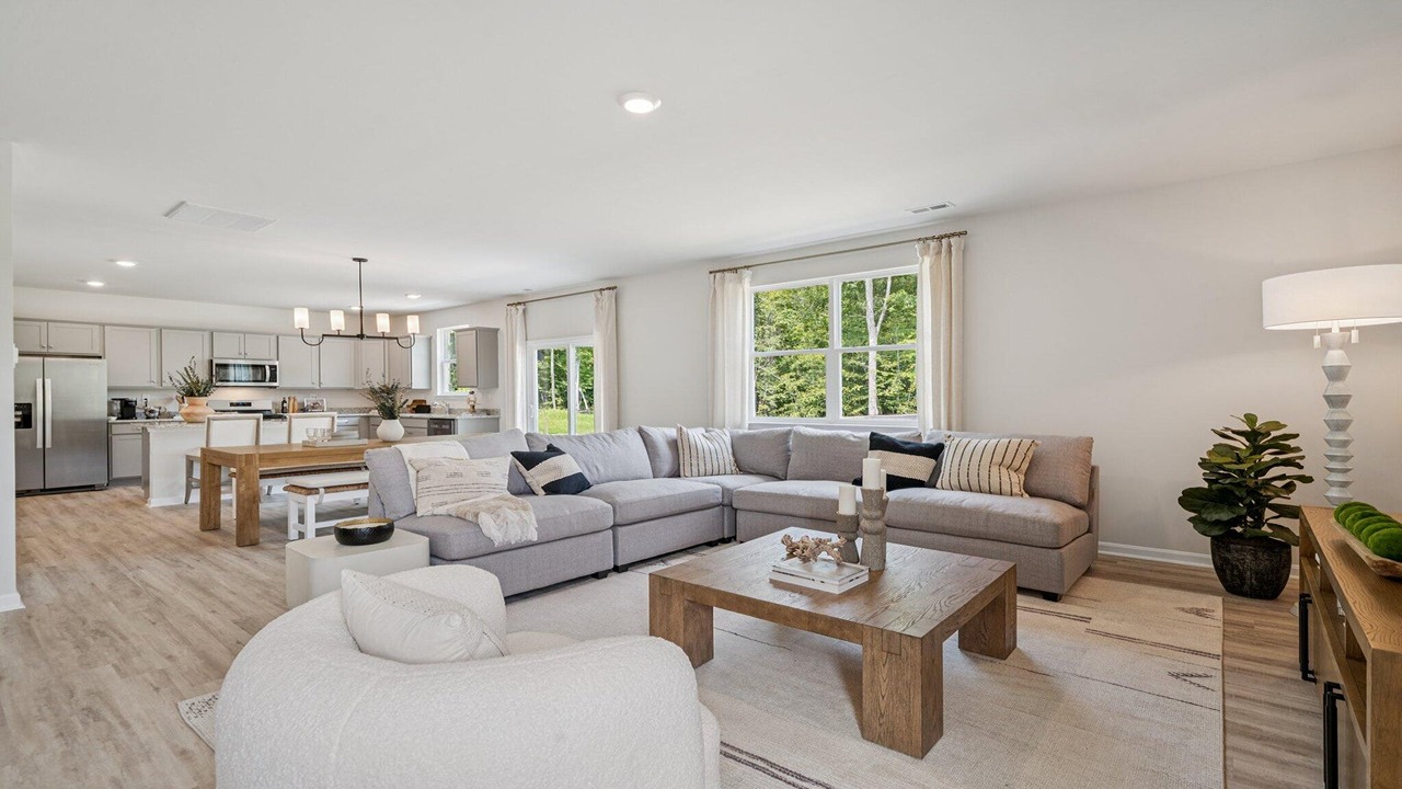 Open-concept living room and kitchen with a seamless layout for entertaining.