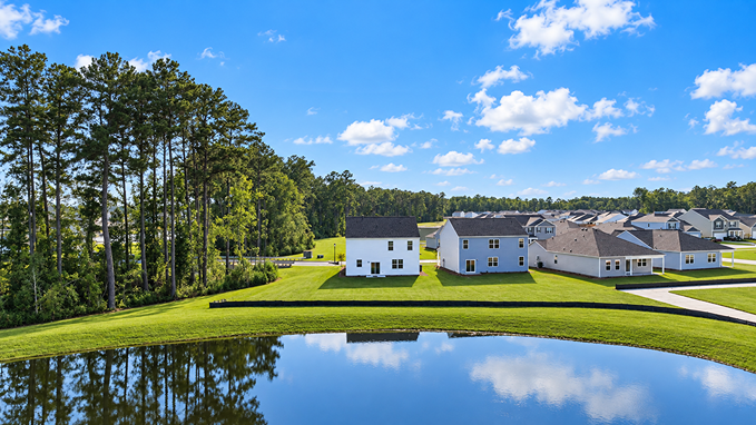 backyard with pond views