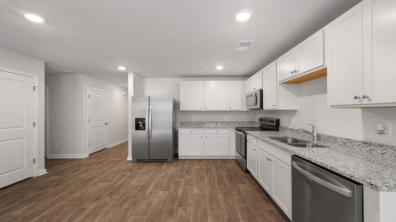 Stainless steel appliancesand spacious kitchen