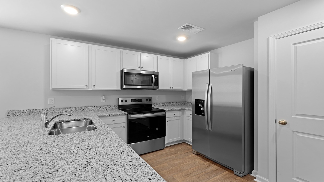 Kitchen with granite countertops