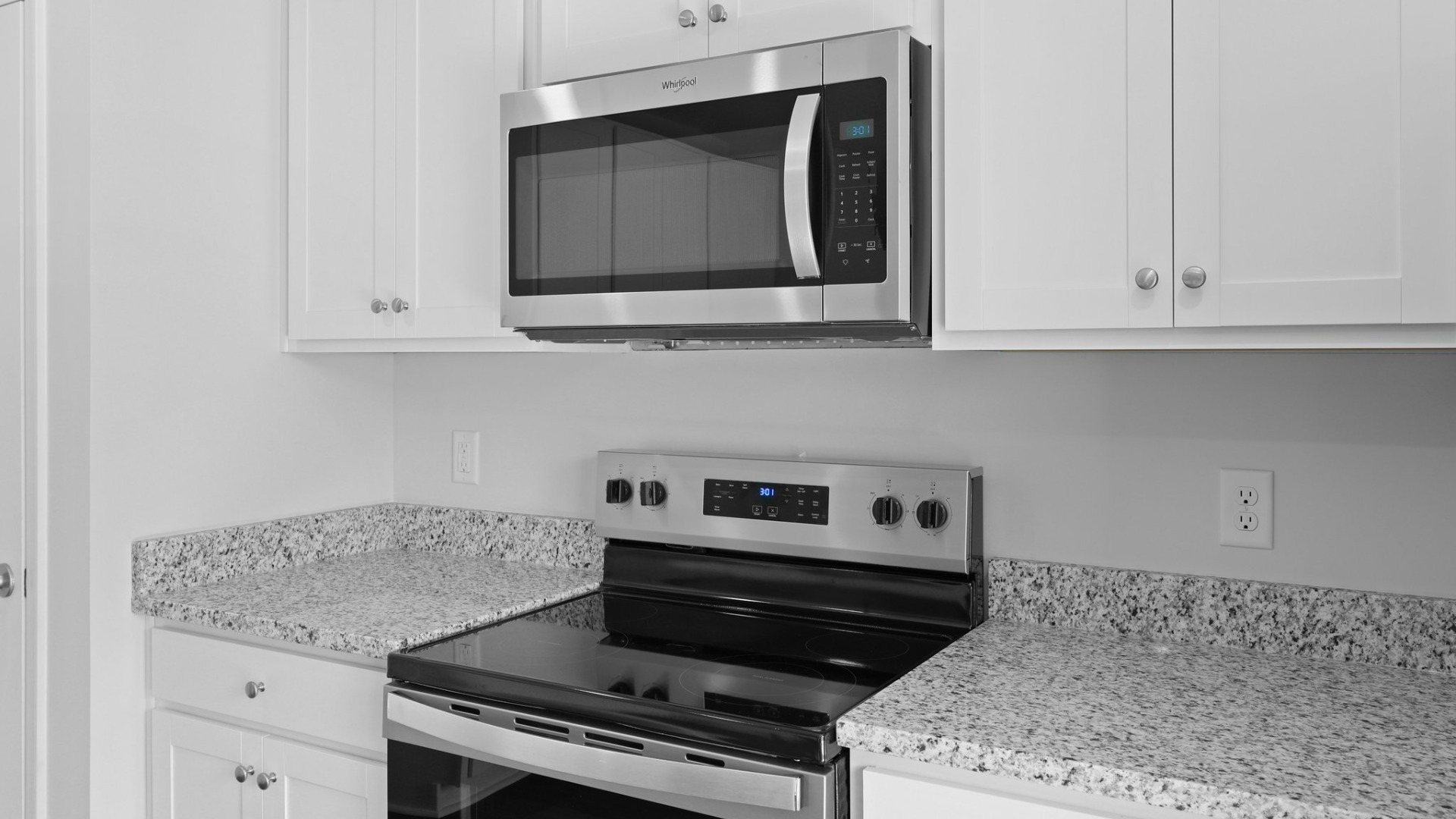 The stove and oven are serperated from the island giving more space to move around.