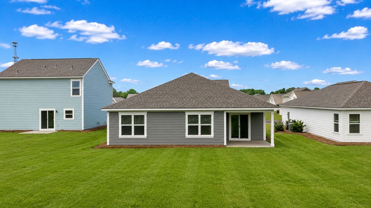 Single story home backyard