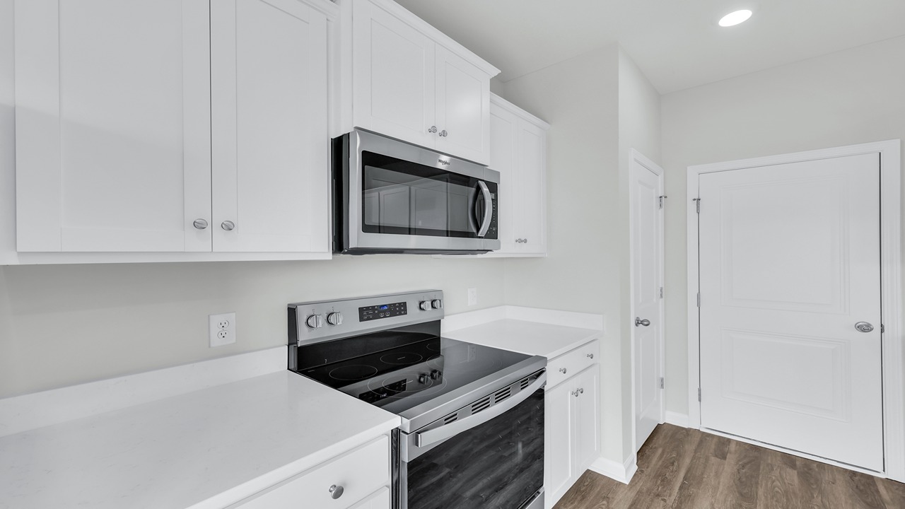 Pantry is located in the kitchen as well as the entrance to the garage.