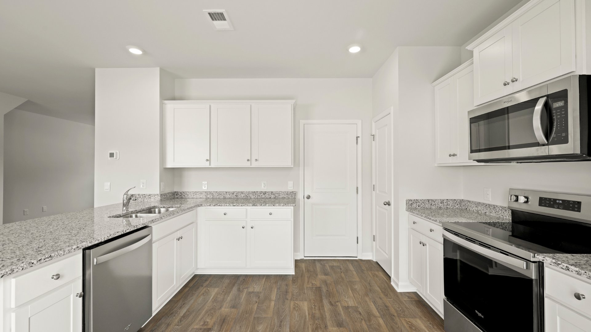 Kitchen with white cabinetry