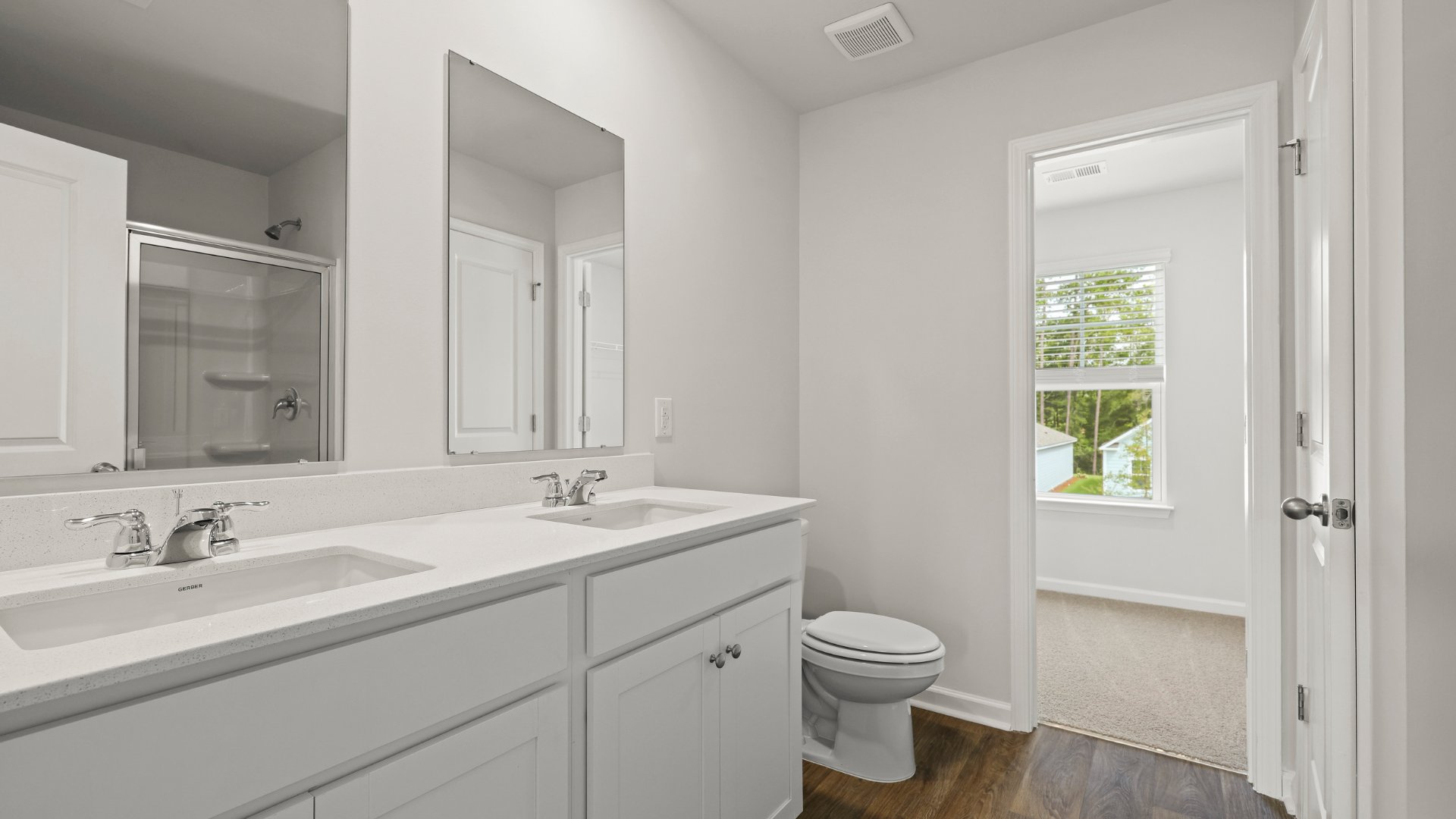 Primary bathroom with dual vanity