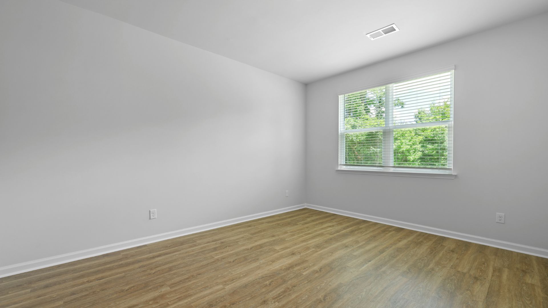 Primary bedroom with natural light