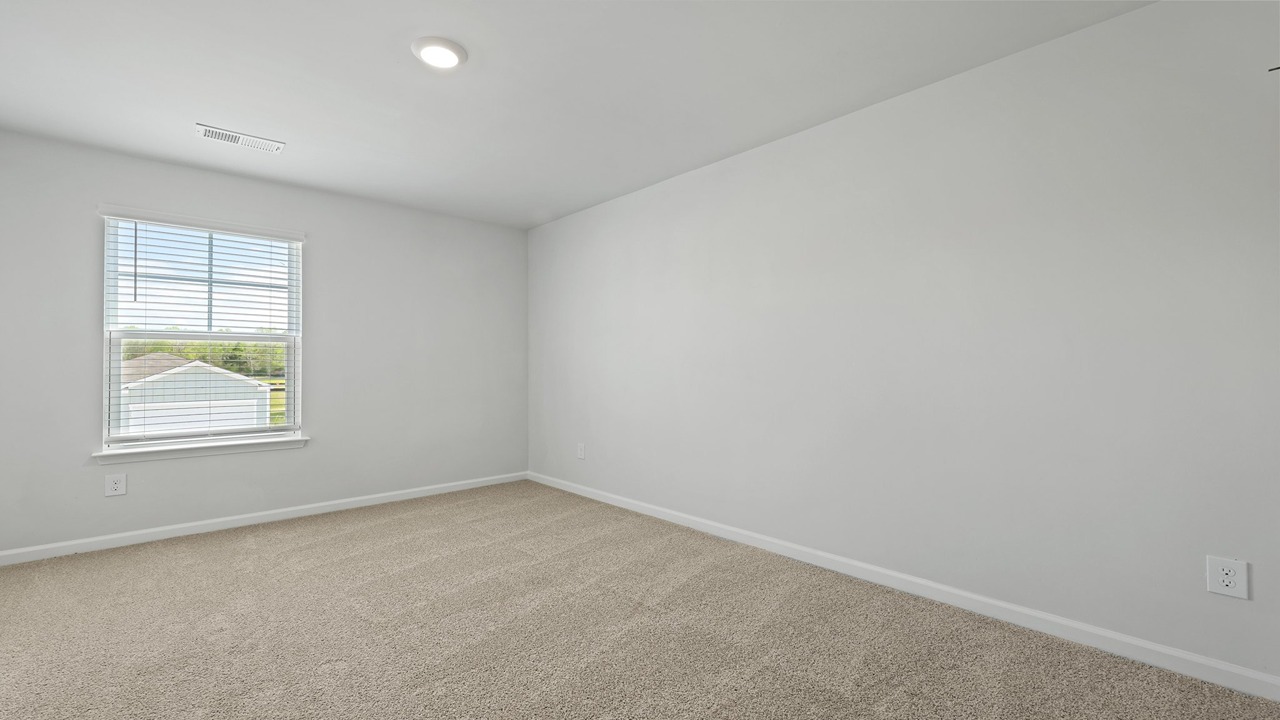 Guest bedroom with carpet