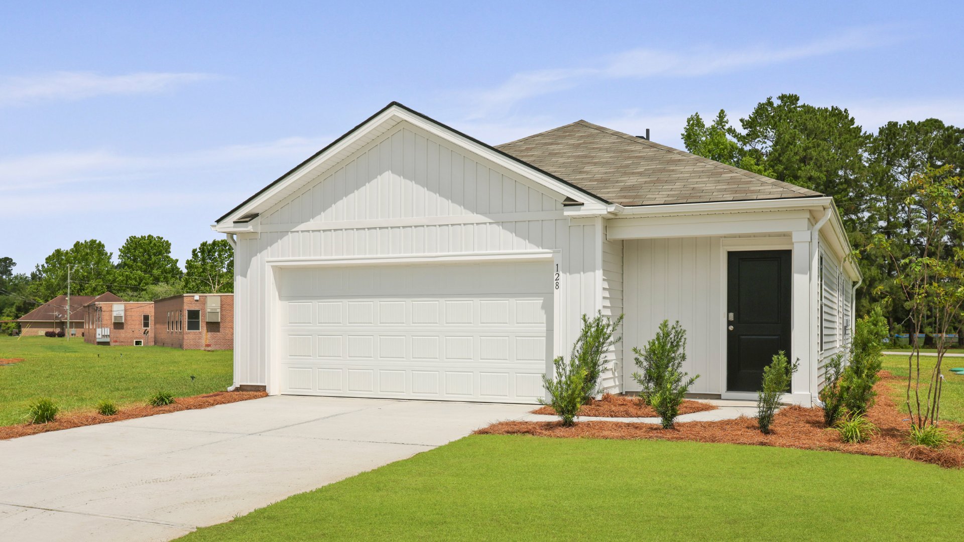 The Downing floorplan is 3 bedrooms and 2 bathrooms with a 2 car garage in Holly Hill, South Carolina.