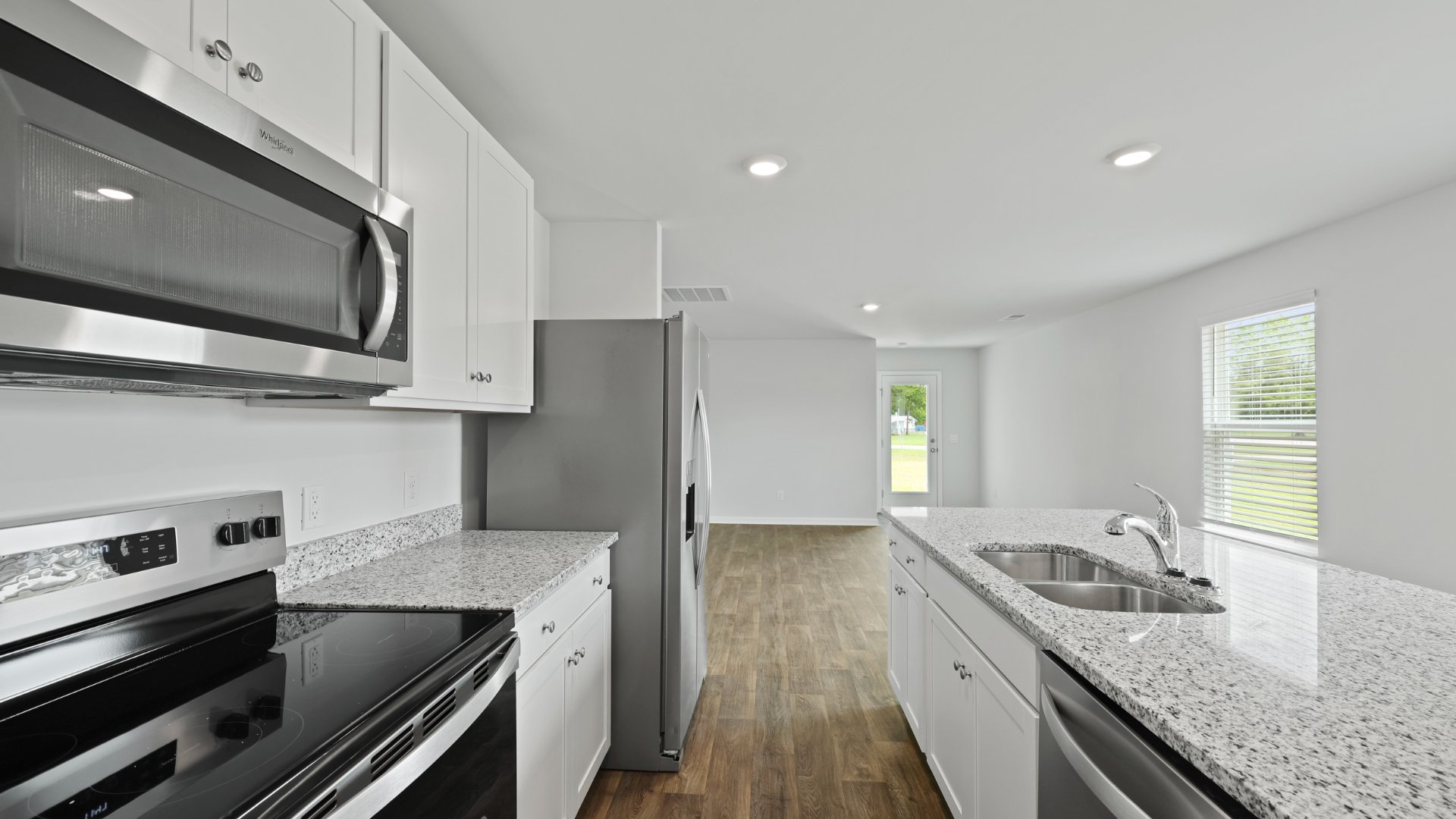 There is ample storage space in the cabinetry located in the kitchen.