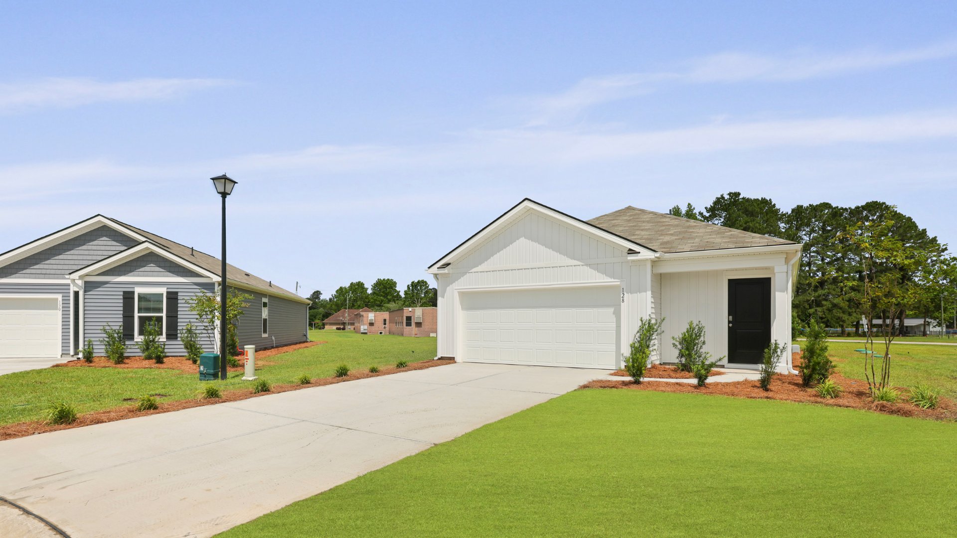 The Downing floorplan is 3 bedrooms and 2 bathrooms with a 2 car garage in Holly Hill, South Carolina.