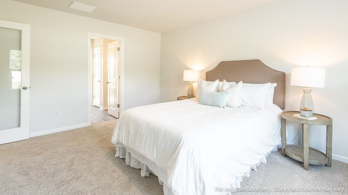 There is an ensuite bathrom and walk-in closet in the primary bedroom.