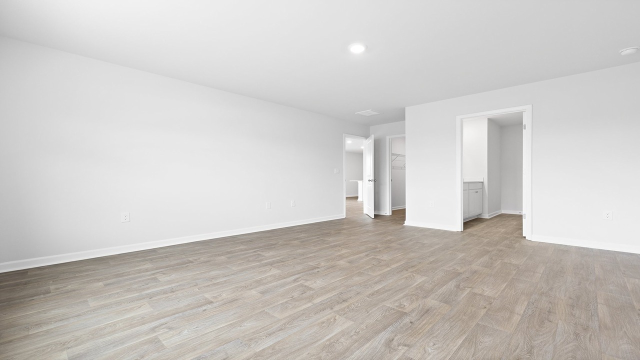 Large primary with walk in closet and bathroom