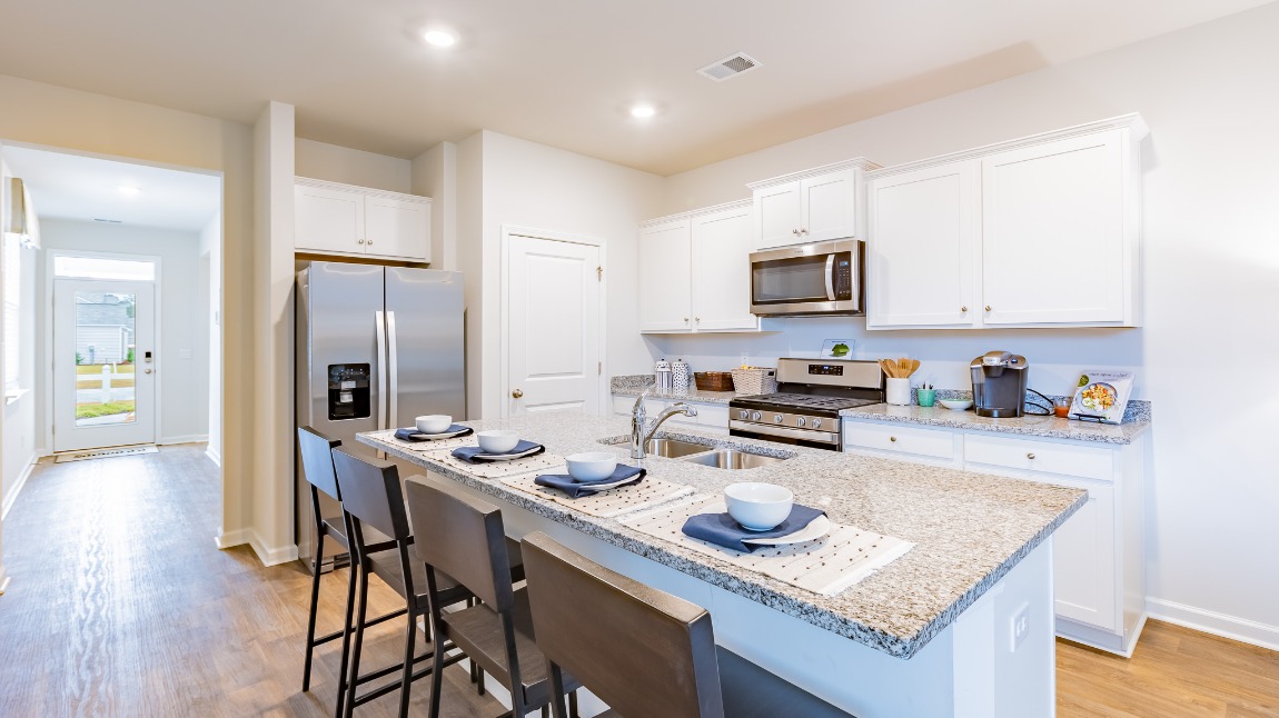 The spacious kitchen and island with room for barstool seating.