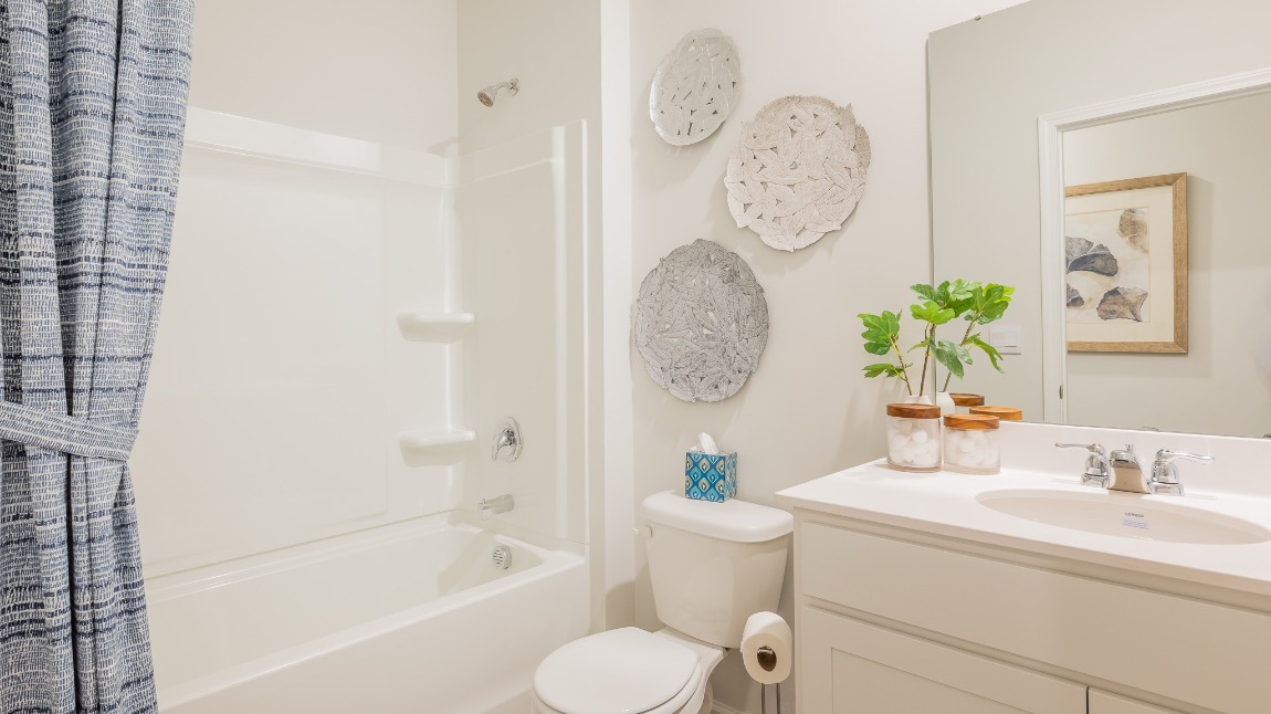 Bathroom 2 is located near bedroom 3 and the foyer for easy access.