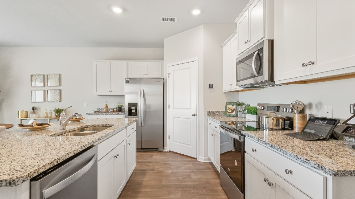 Ample cabinet storage and a pantry.