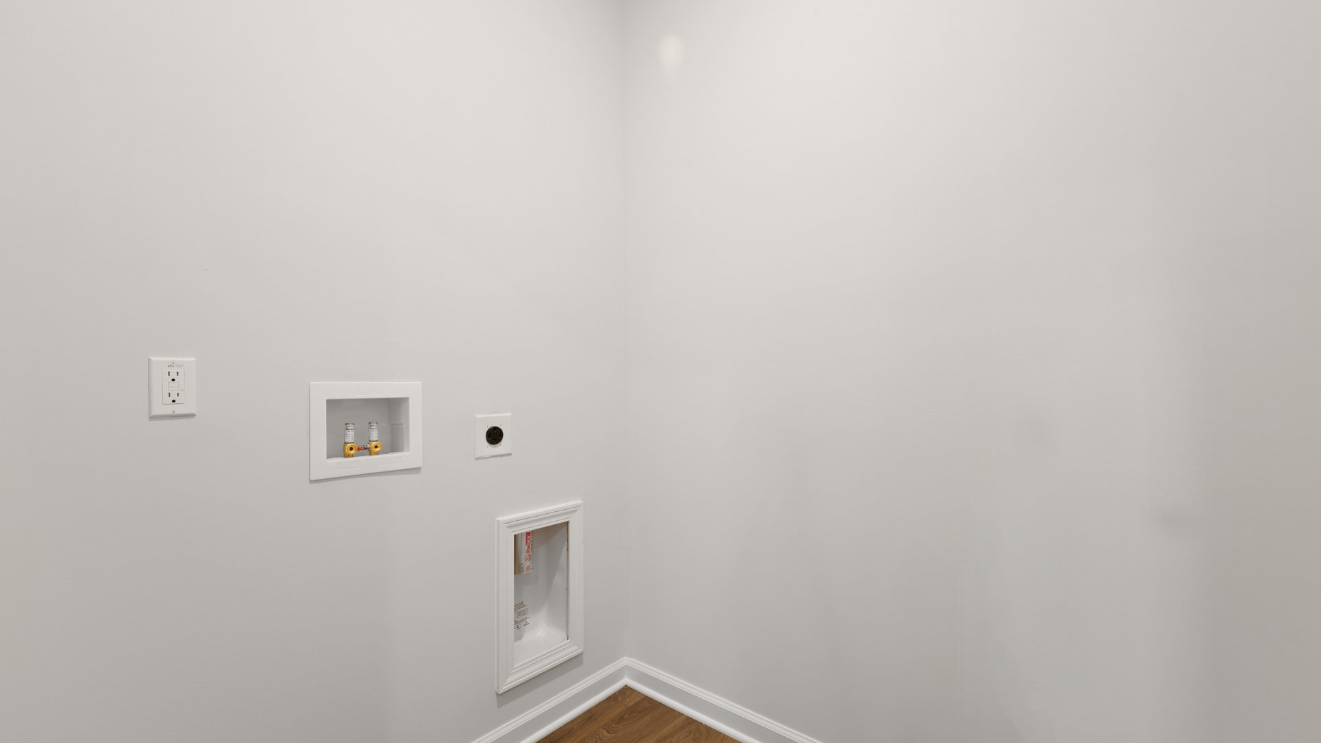 Spacious laundry room.