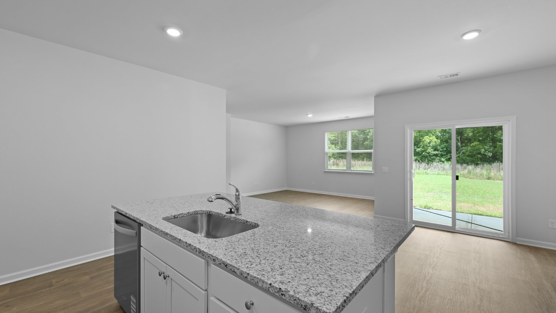 Sliding glass door located in the dining area.