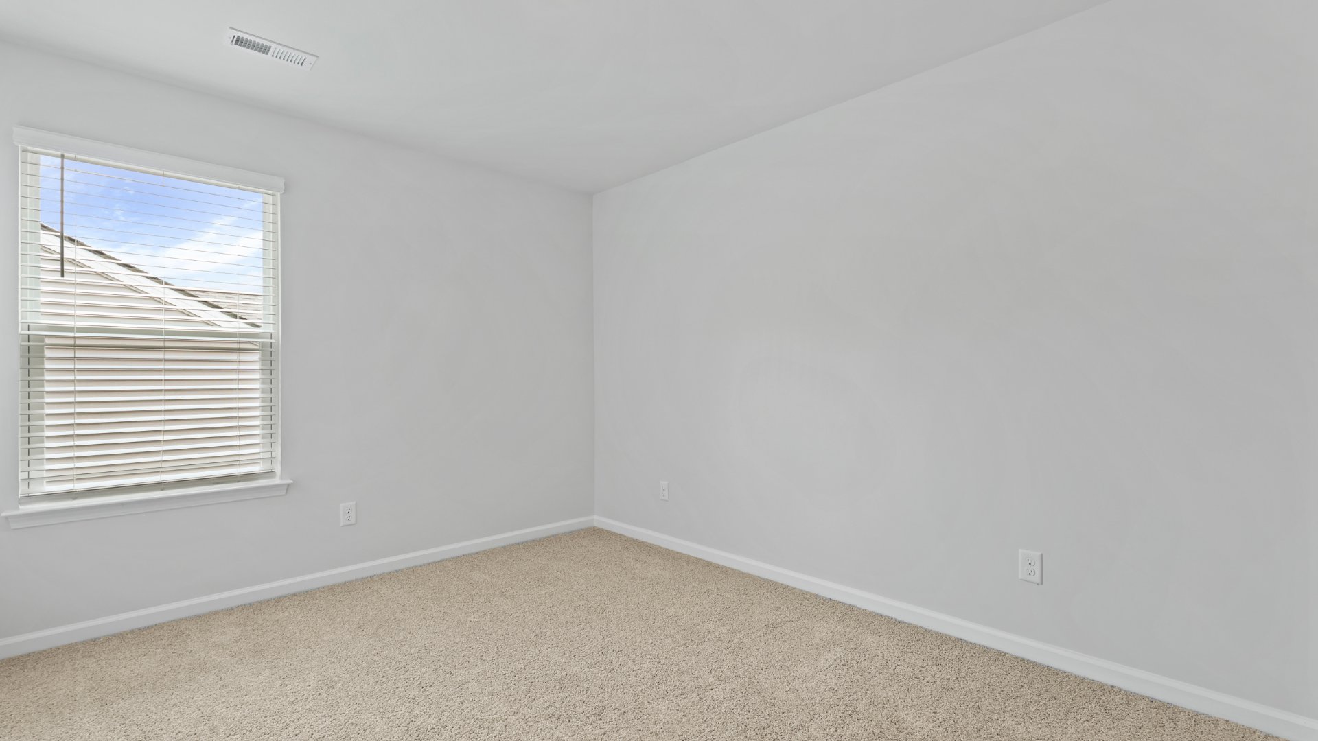 Bedroom 4 is located upstairs with a window that brings natural light to the room