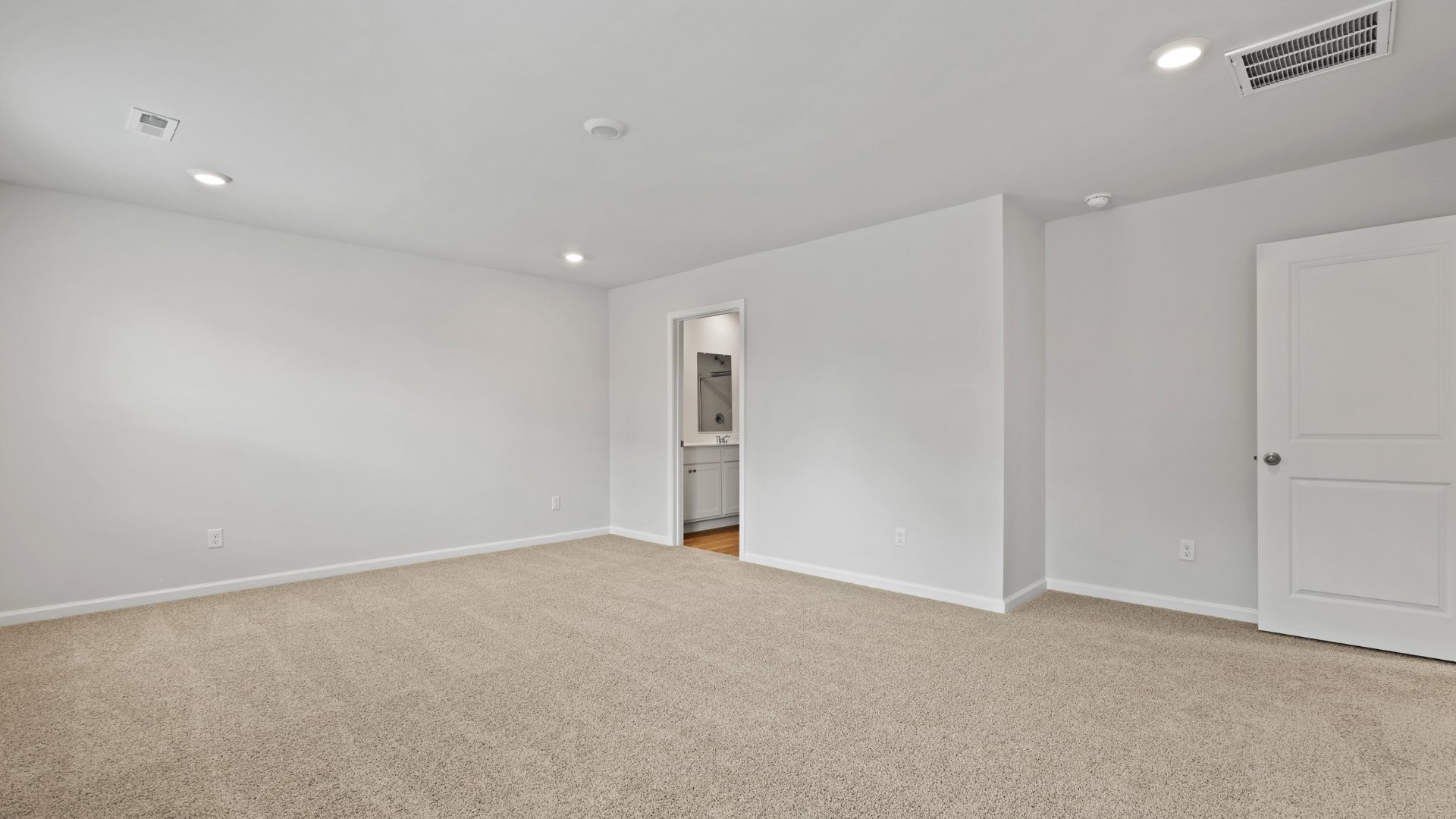 The primary bathroom is ensuite as well as the walk-in closet.