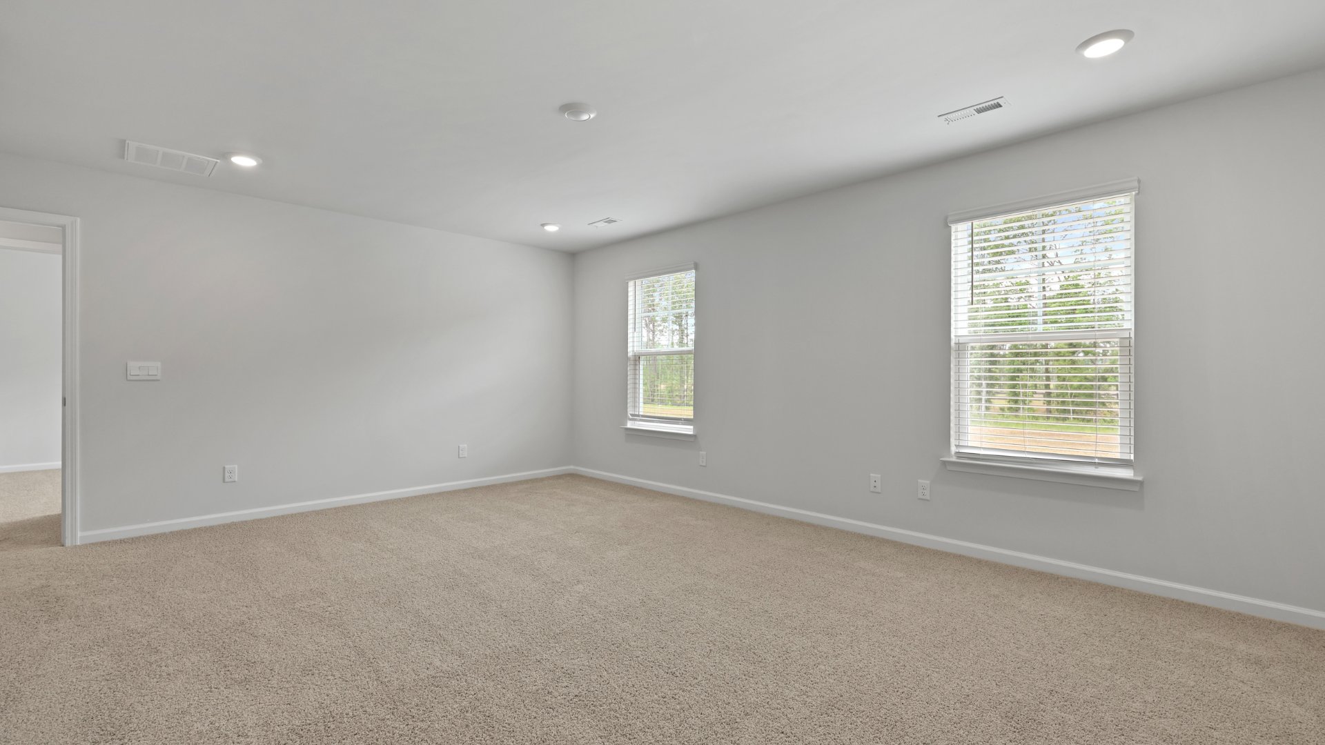 The bright and spacious primary bedroom.