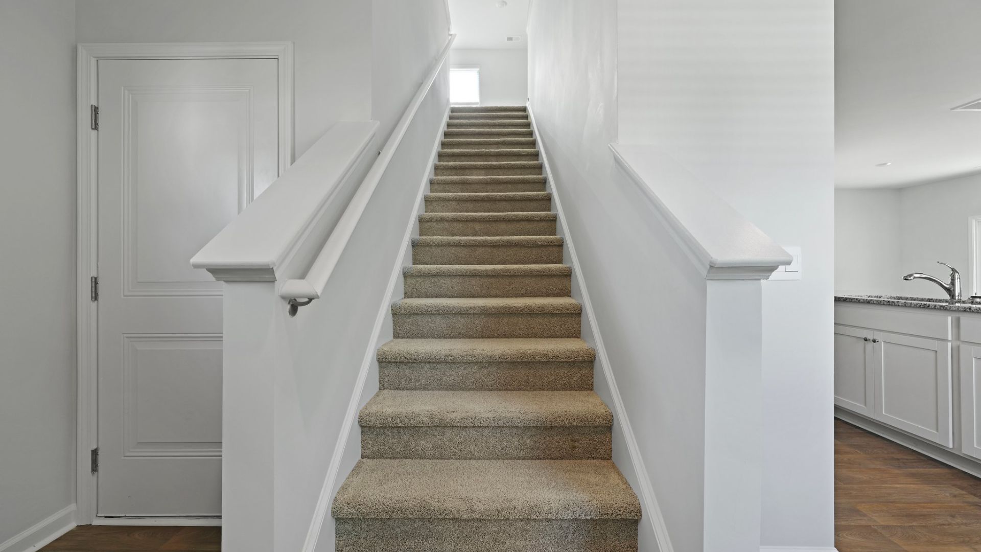 The staircase leading to the second floor.