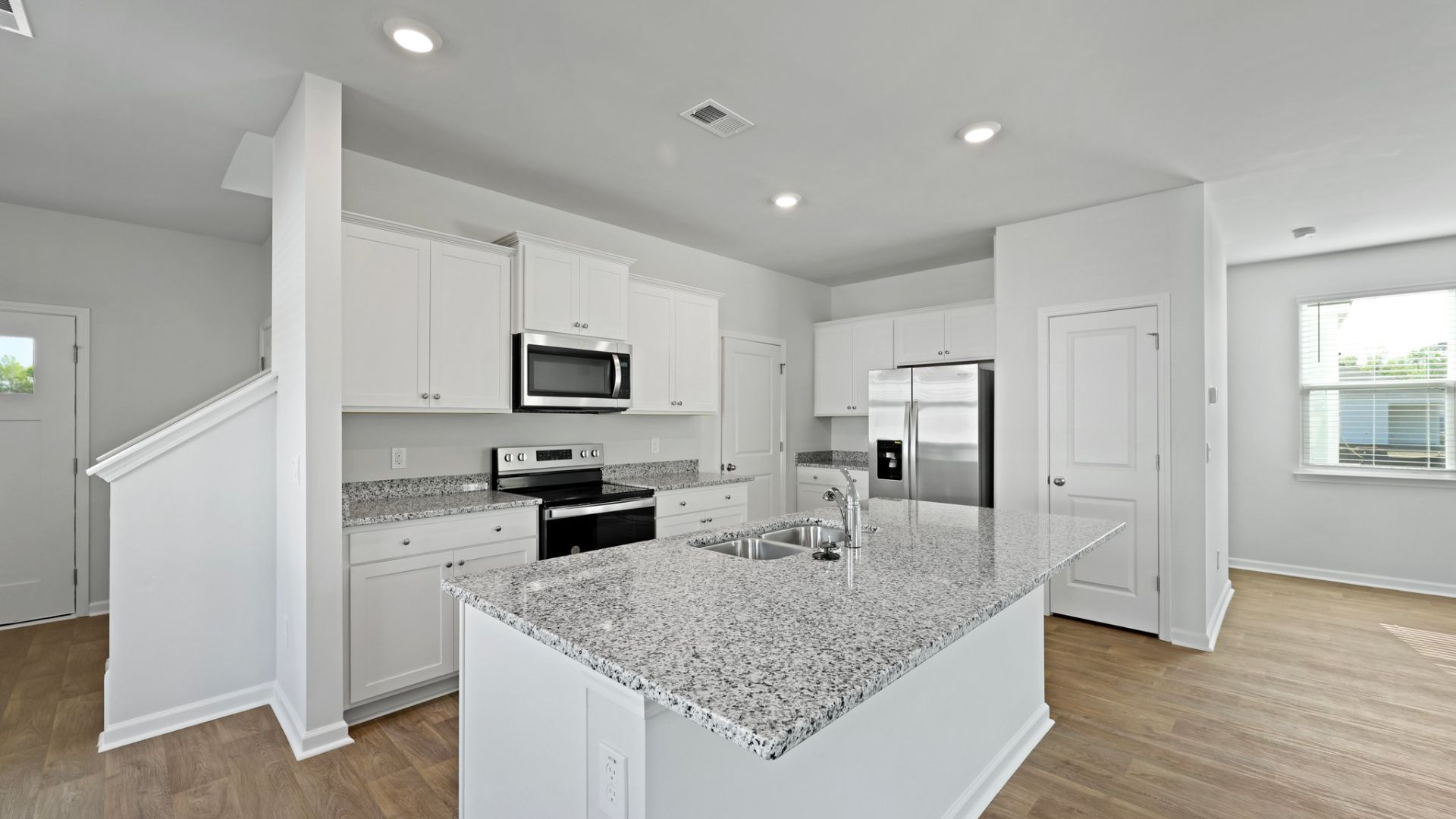The Elston floorplan in Huggins Hill is open concept.