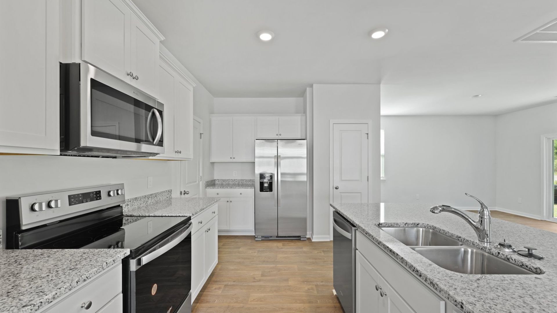 There is ample cabinet storage as well as a pantry in the kitchen.
