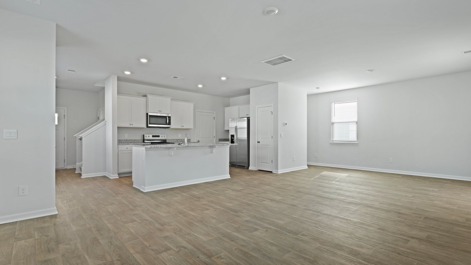 There is room for barstools under the island for extra seating.