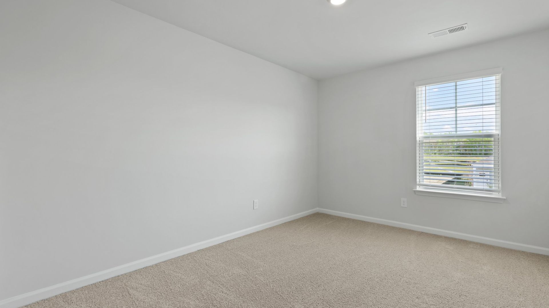 Bedroom 3 is located on the second floor and is carpeted.