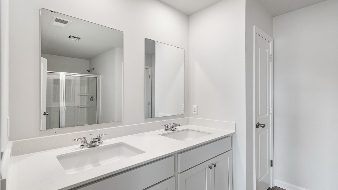 Primary bathroom with dual vanity