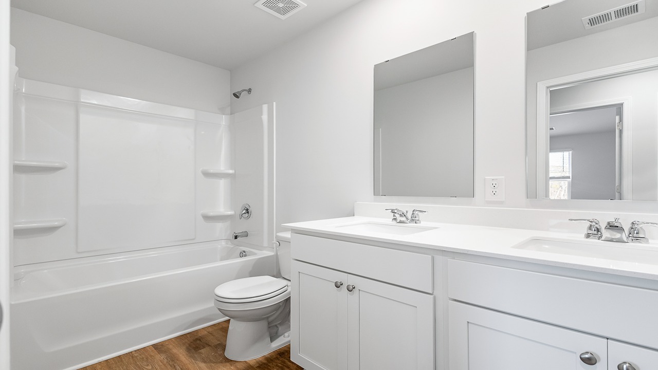 Guest bathroom with dual vaity
