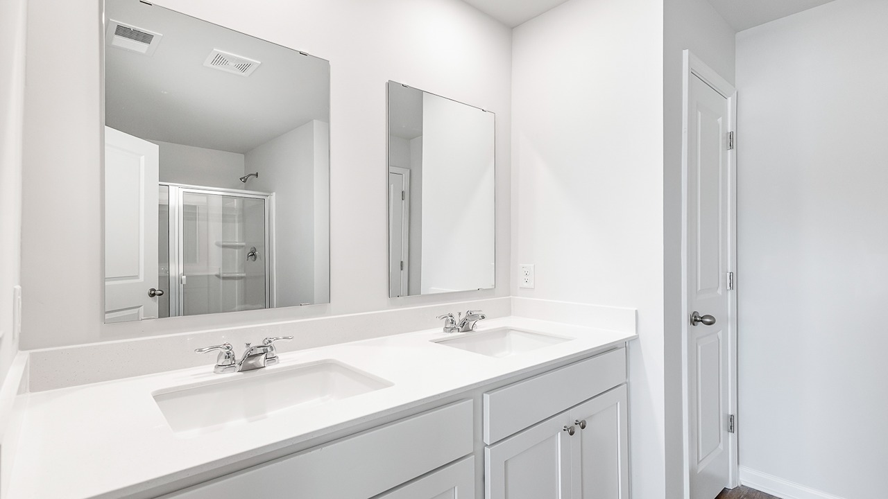 Primary bathroom with dual vanity